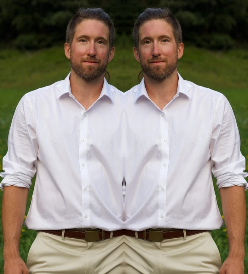 Zane next to a mirrored copy of Zane